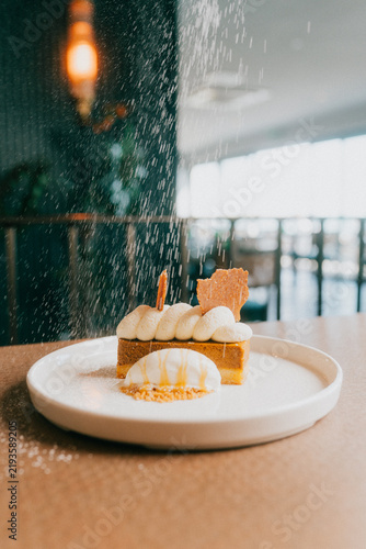 Obraz na plátne Close-up of a delicious pumpkin cheesecake dessert on a white plate