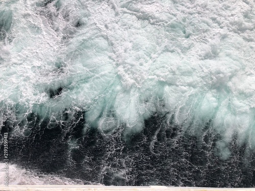 Canvas Print Large Ocean Waves Viewed From Cruise Ship Deck on Sunny Day, Teal Water and Whit