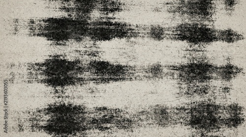 Distressed grunge texture with horizontal dark ink brush strokes on paper