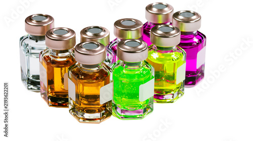 Obraz na płótnie Isolated group of colorful medical vials or small perfume bottles arranged for d