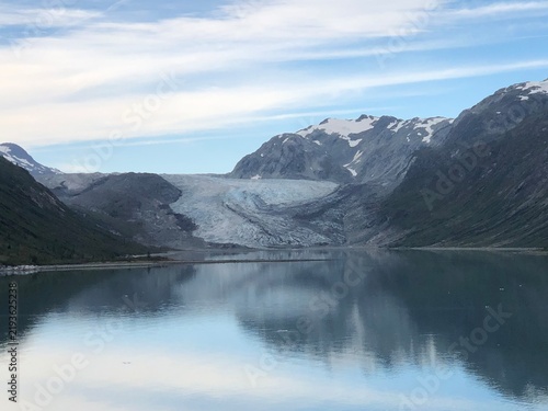 Wide Angle View of Reid Glacier Terminus and Ice Field Reflecting in Calm Fjord, Glacier Bay Alaska