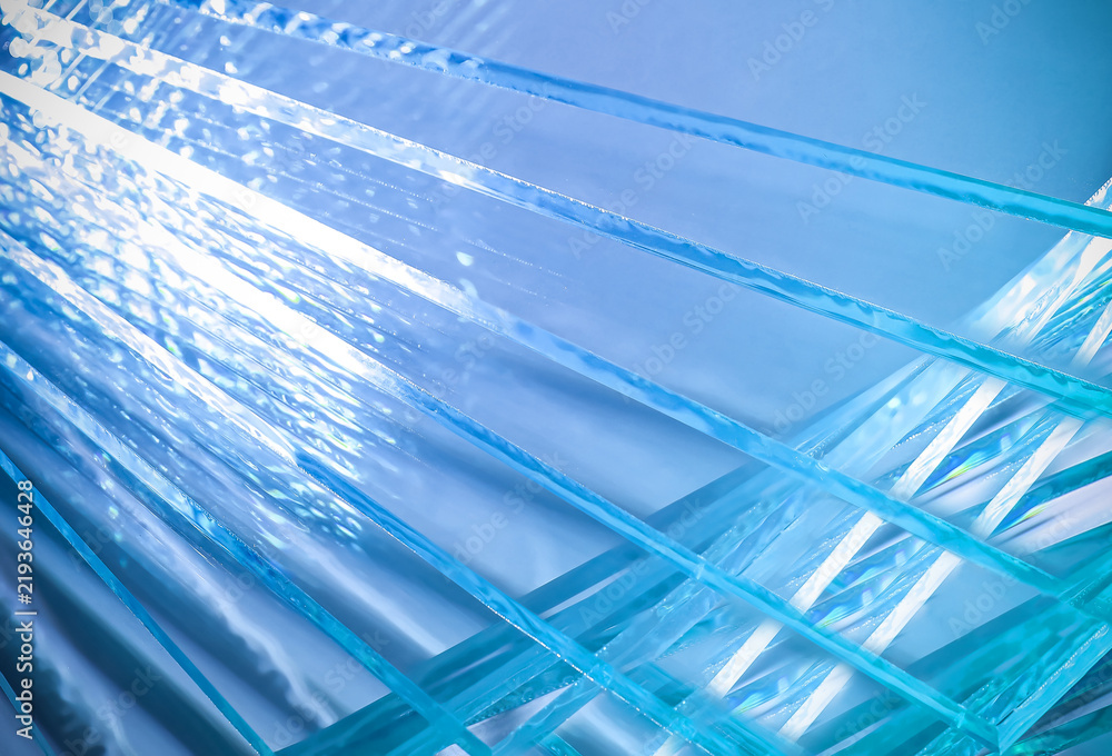Obraz premium Closeup view of many stacked glass sheets