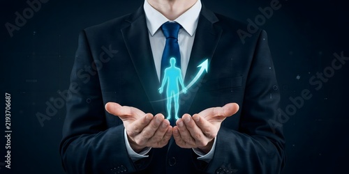 Businessman Holding Digital Human Symbol Representing Recruitment Talent Management Leadership And Career Growth