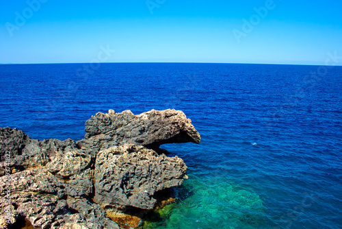 Fotografie Rocky coastal formations near Cape Cavo Greco in Cyprus