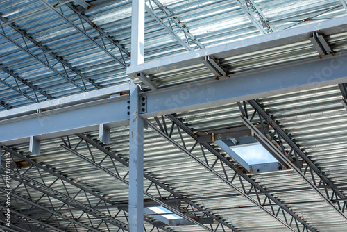 Принти на полотні Structural steel framework building with corrugated metal decking and concrete b