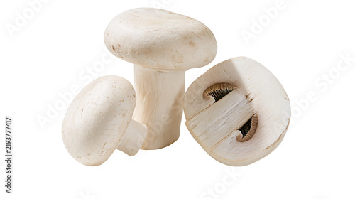 Fotografía Isolated fresh white button mushrooms, one cut in half revealing internal gills,