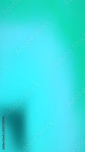 Abstract blurred background with a smooth gradient transition from vibrant turquoise to soft cyan, creating a clean and modern minimalist aesthetic