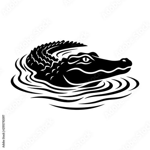 Black Silhouette of an Alligator Swimming in Water