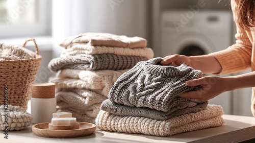 Winter clothing care with knitted sweaters and laundry items in a bright utility room Generative AI