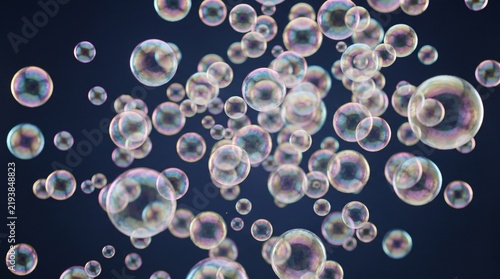 Iridescent soap bubbles drift against a dark navy background