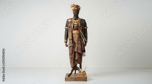 Traditional Javanese Wedding Attire Displayed on a Mannequin
