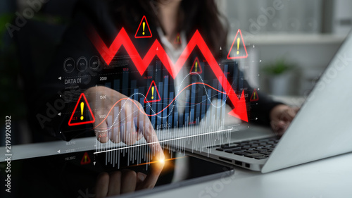 Canvastavla Economic caution visualized with fluctuating market graph, alert symbols, and negative data trends