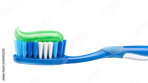 Fotografie Blue toothbrush with green mint toothpaste swirl on white background, solated on