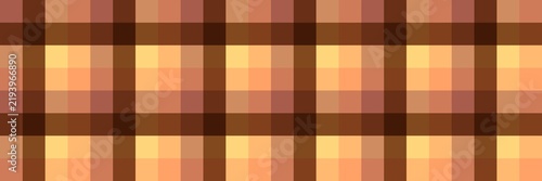 Seamless pixelated plaid pattern in warm brown and orange tones.