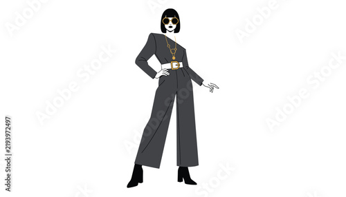 Fashionable young woman posing in a sleek dark grey jumpsuit, designer sunglasses, and black high heeled boots.