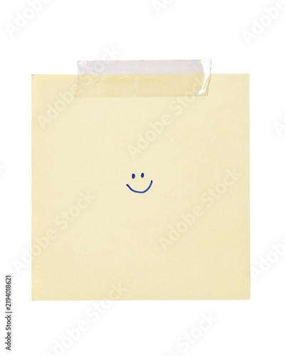 Obraz na plátně Yellow sticky note with blue smiley face and tape solated on transparent backgro