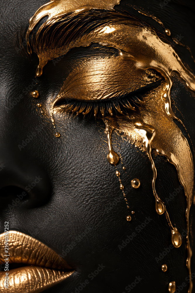 Obraz premium Avant Garde Black Face Makeup with Molten Gold Tears and Metallic Lips
