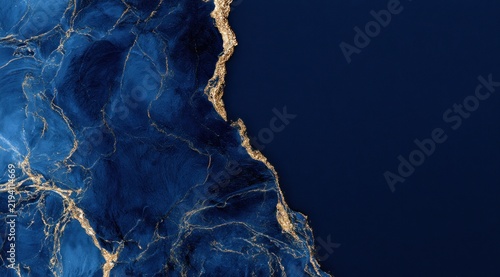 Abstract background of blue marble texture with gold veins and copy space