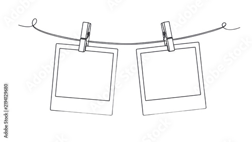Two polaroids hanging on string with clothespins vector isolated on transparent background