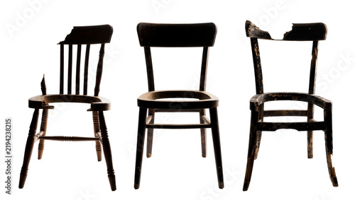 Three antique broken wooden chairs showing wear and tear, isolated on transparent background