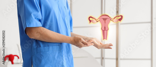 Fotografía Gynecological health and reproductive medicine, doctor holding a glowing human u