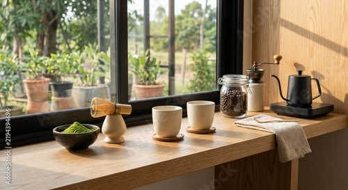 Matcha Tea Preparation with Traditional Bamboo Whisk and Coffee Brewing Tools by a Sunny Window