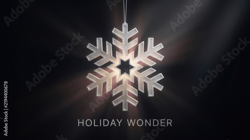 Glowing snowflake ornament and Holiday Wonder text hanging in light on dark background