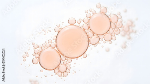 Obraz na płótnie Macro Peach Oil Bubbles on White Background