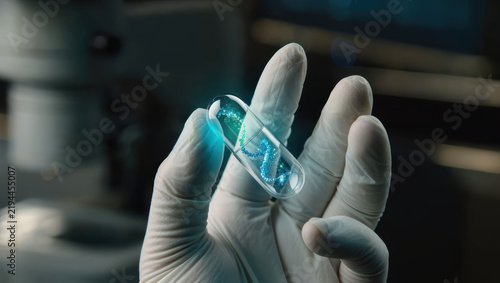 Gloved hand holding glass vial with glowing blue liquid in laboratory, creating mysterious scientific mood