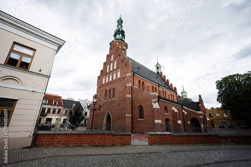 Картината върху платно Historic brick St John the Baptist church in Radom, Poland with Gothic architect