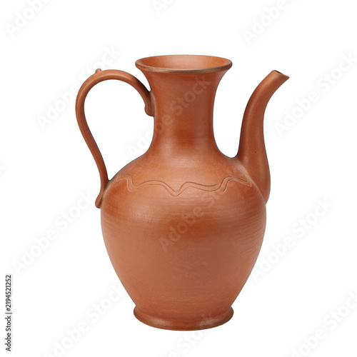 Traditional handmade clay pitcher featuring textured patterns for beverage