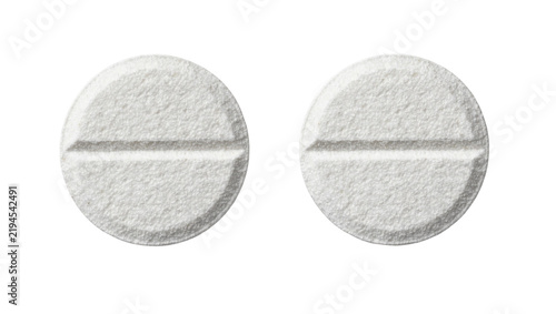 Quadro su tela Two round white pills with scored lines, isolated on transparent background