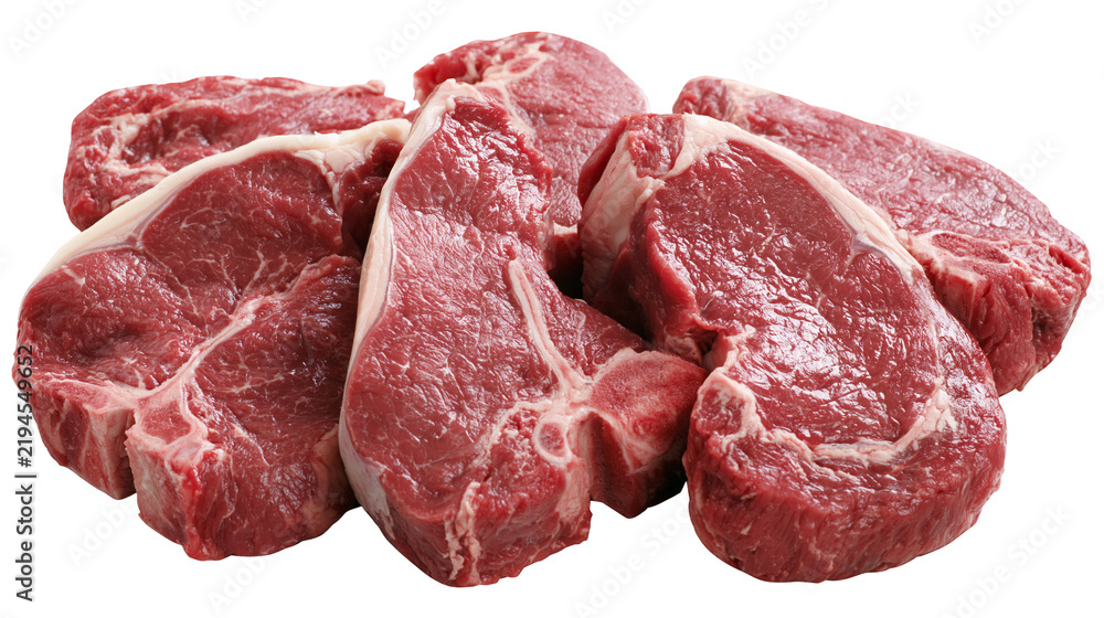 Obraz premium Isolated raw beef steaks and chops arranged for grilling, fresh red meat cuts ready to cook.
