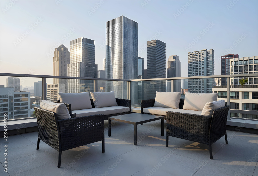 Fototapeta premium Urban lifestyle and luxury real estate, modern rooftop terrace with outdoor furniture overlooking a high-rise city skyline at sunset