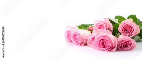 A bouquet of pink roses on a white background. Greeting banner.