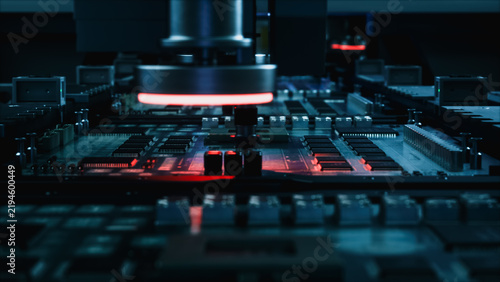 Картината върху платно Red Ring Illuminator on a Machine Vision Head Scans Soldered Chips, Capacitors a