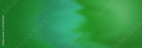 Foto Abstract green glitter texture background with a soft gradient transition from d