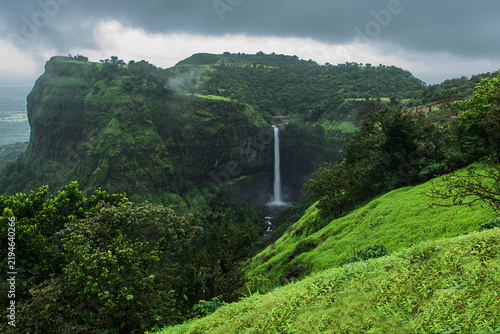 Kumbhe Waterfall, a scenic 178-foot (60-meter) high waterfall located near Kumbhe village, lush and green Sahyadri ranges, Western Ghats, Mangaon, Raigad district, Maharashtra, India.