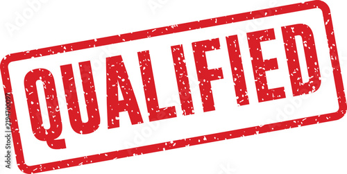 A bold red grunge effect rubber stamp prominently features the word QUALIFIED on a stark white surface