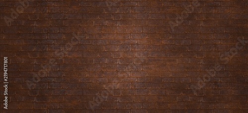 Rustic dark brown brick wall texture background. This weathered industrial brickwork features warm bronze, copper, and rust tones with a subtle central vignette spotlight effect