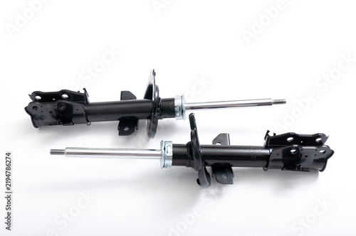 Black front shock absorbers for car.