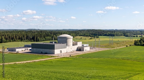 Small modular reactor plant nestled in open countryside