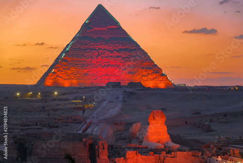 The great Sphinx and pyramid illuminated at sunset, Giza near Cairo, Egypt