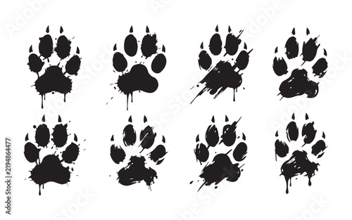 Grungy black animal footprints set with paint drips and ink splatter for edgy art styles.