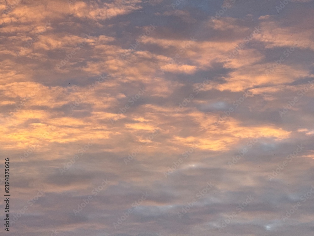 Fototapeta premium Fantastic sunset sky, colorful clouds, natural sunset sky background