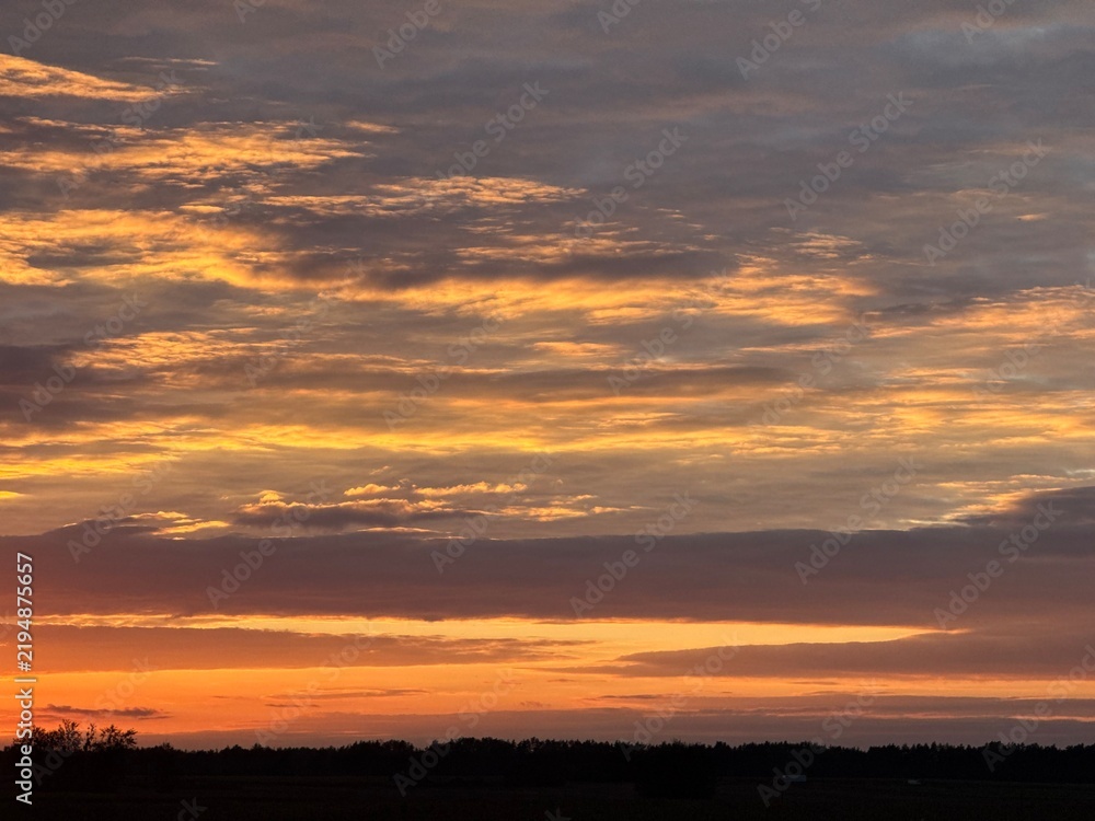 Fototapeta premium Fantastic sunset sky, colorful clouds, natural sunset sky background