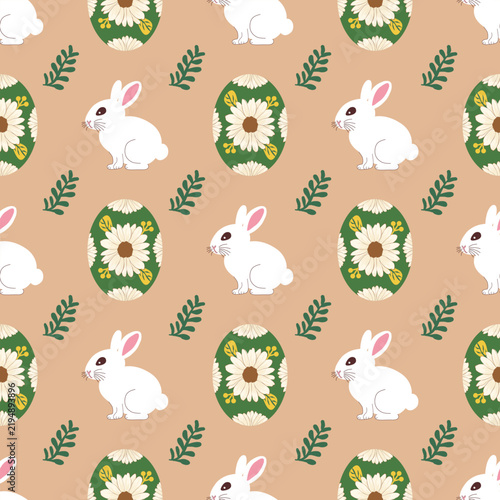 Easter seamless pattern featuring white rabbits green Easter eggs decorated white daisy flowers yellow leaves, small green leafy twigs, light brown background vector