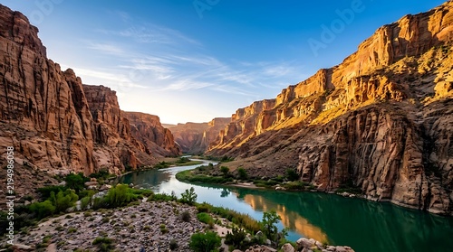 Dramatic canyon landscape with river at sunset in the american southwest