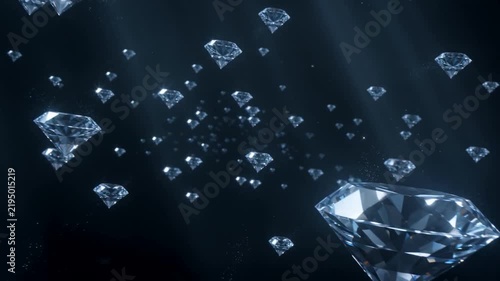 Sparkling diamonds float in a dark space with light beams shining through at night