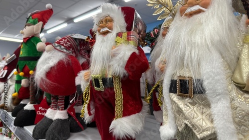 Bearded Christmas Figurines with Gifts on a Store Shelf